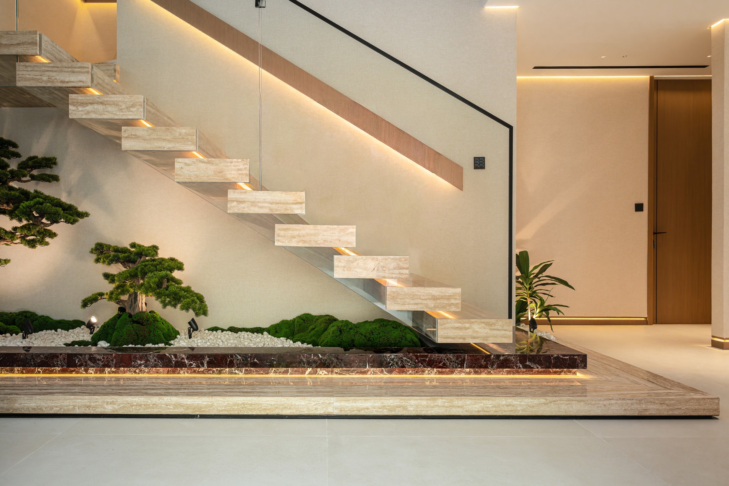 Marble and stone staircase finished by Elevate Fit-Out